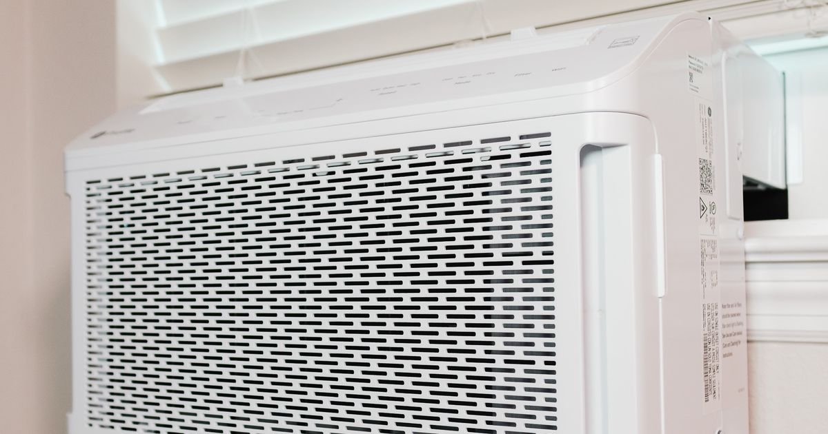 A window air conditioner installed in a residential unit